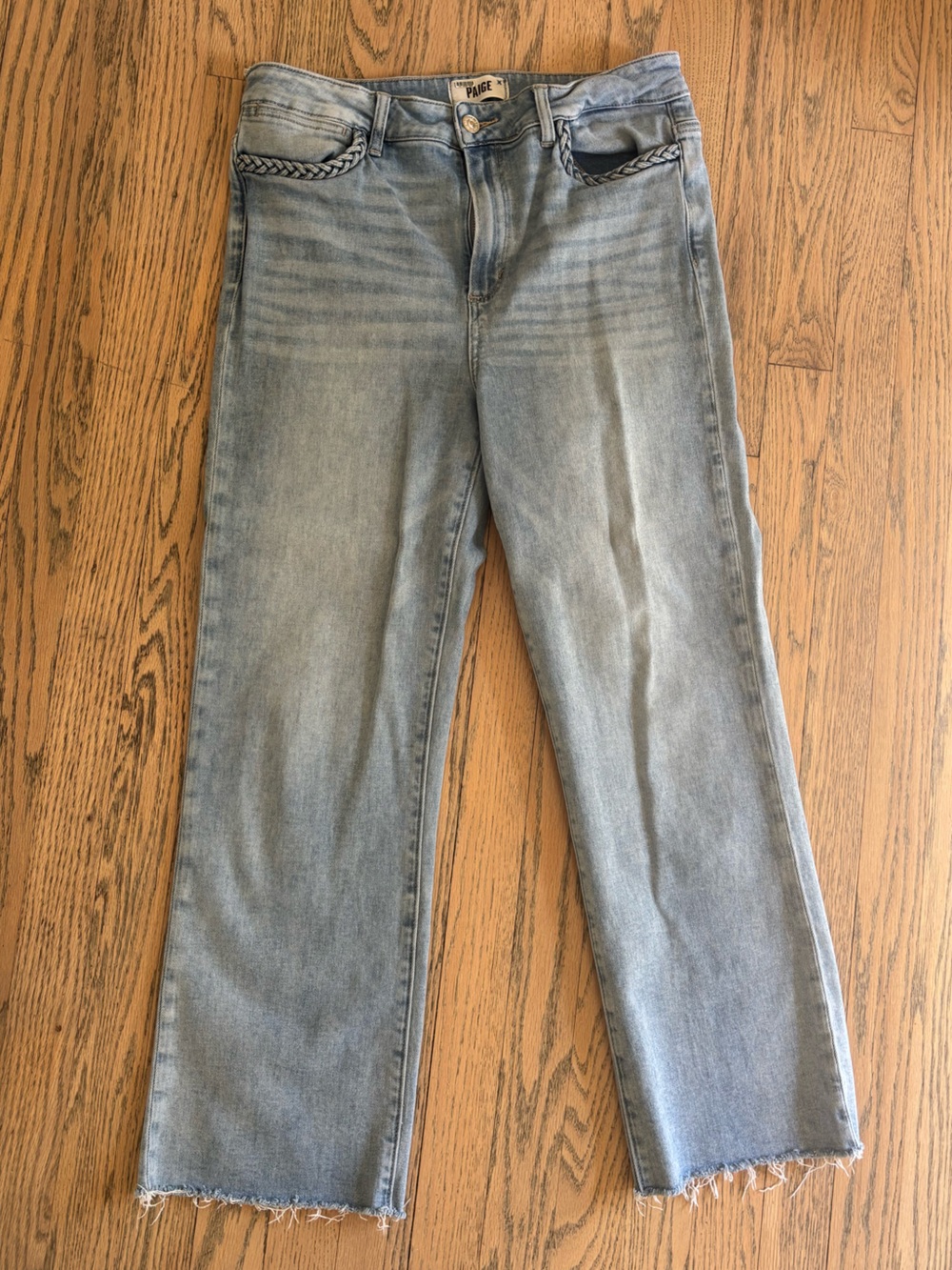 PAIGE Atley Cropped Flare Light Wash Ankle Jeans with raw hem and braid detail